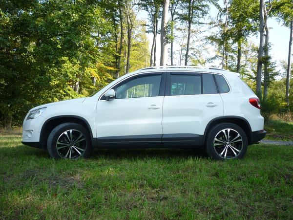 Отзыв владельца автомобиля Volkswagen Tiguan 2.0 TSI авт 2009